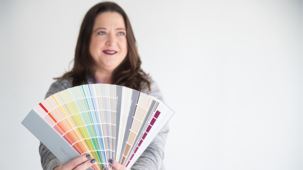 Courtney holding paint samples